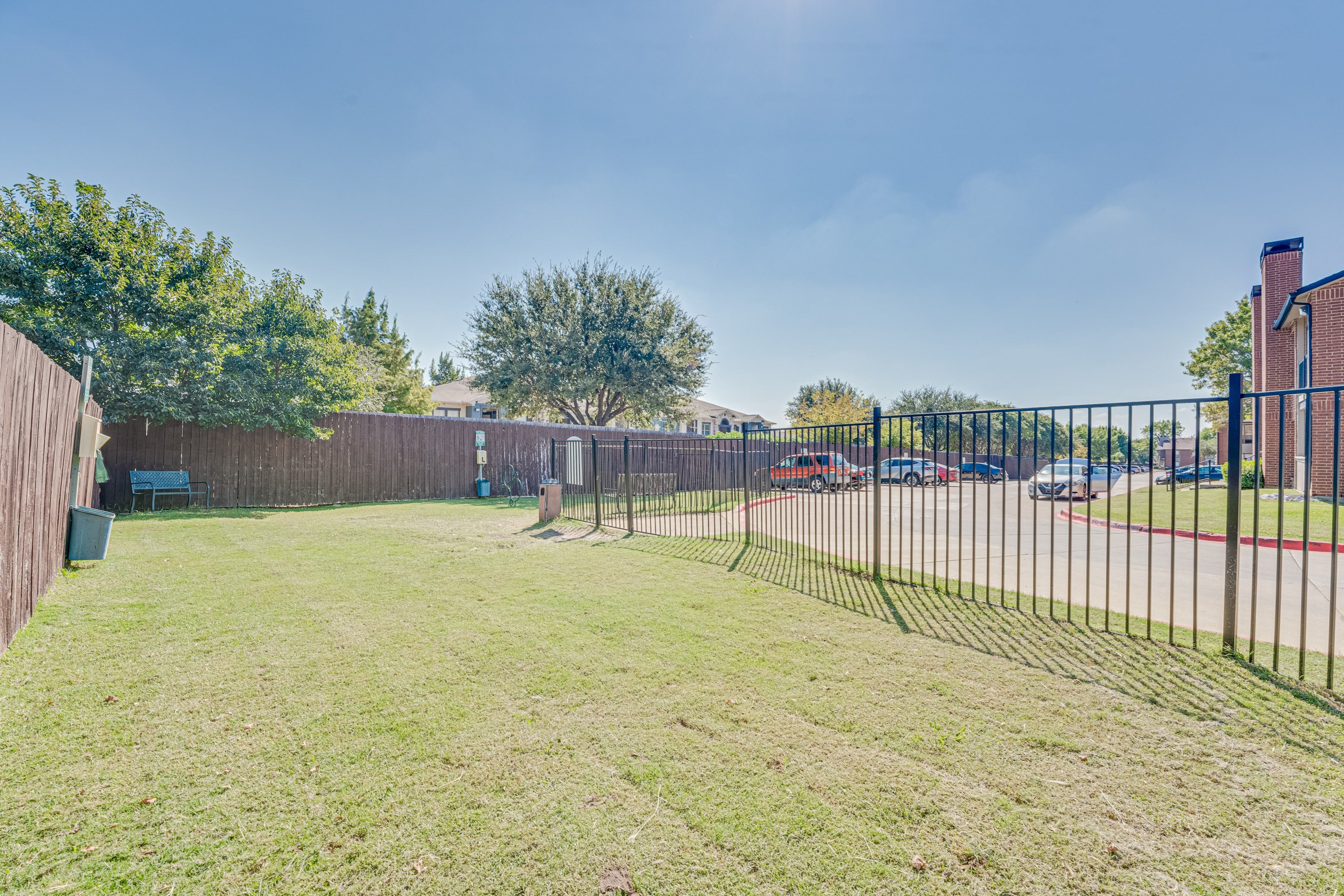 Backyard with a fence at Bardin Oaks Apartments, Arlington, TX, 76018